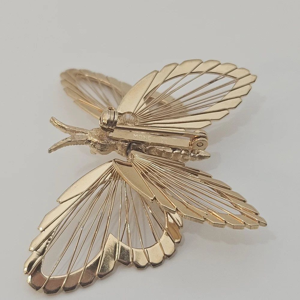 Vintage Monet gold tone butterfly brooch signed